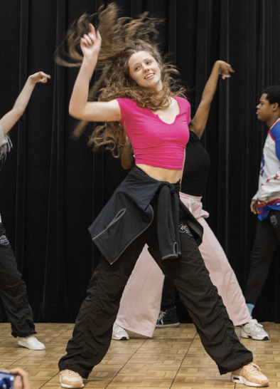 NE student and Movers Unlimited member Alicia Hobson dances during
the group's performance at Club Rush.